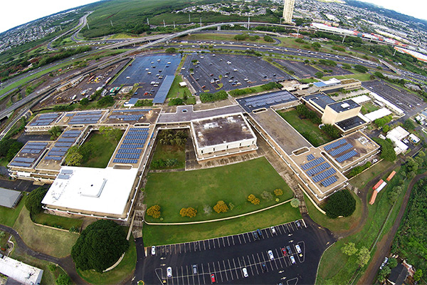 aerial photo of solar power grids on campus
