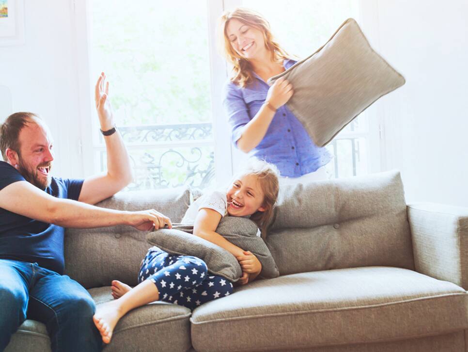 A family spending quality time in their living room