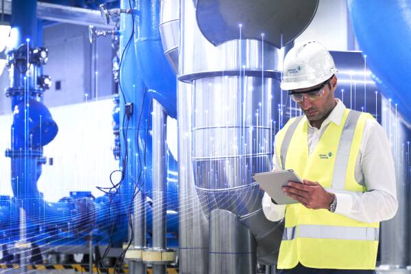 worker looking tablet thumb