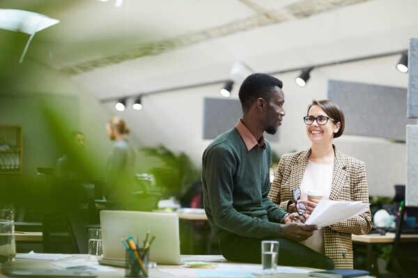 People discussing in office